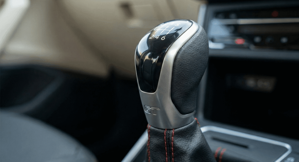 Virtus GT Manual Gear Stick Close up of the 6-speed manual gear shifter in a Volkswagen Virtus GT interior.